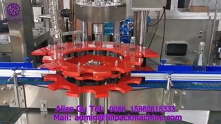 2211 J118 Vakuumfüll- und Seitenziehlaschen-Verschließmaschine für geteilte Glasflaschen